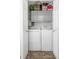 Convenient laundry closet with a washer, dryer, and overhead storage at 5741 91St N Ave, Pinellas Park, FL 33782