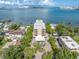 Amazing aerial view of the condo with water views and lush landscaping at 602 Lime Ave # 102, Clearwater, FL 33756