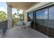 Relax on the balcony with seating and enjoy water views, blending indoor and outdoor living at 602 Lime Ave # 102, Clearwater, FL 33756