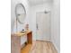 Welcoming entryway features stylish console table, décor, and lovely flooring at 602 Lime Ave # 102, Clearwater, FL 33756