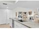 Lovely kitchen features stainless steel appliances, granite countertops, and a lovely sink at 602 Lime Ave # 102, Clearwater, FL 33756