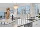 Gorgeous kitchen features stainless steel appliances, a granite countertop, and nice views at 602 Lime Ave # 102, Clearwater, FL 33756