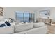 Bright living room with ocean views, comfortable seating, and modern entertainment setup at 602 Lime Ave # 102, Clearwater, FL 33756