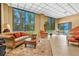 Bright and inviting lobby featuring comfortable seating, large windows, and stylish decor at 602 Lime Ave # 102, Clearwater, FL 33756