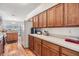 Spacious kitchen design features plenty of cabinets and long countertops at 7046 Frascati Loop, Wesley Chapel, FL 33544