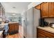 Functional kitchen area with ample storage, counter space, and modern appliances at 7046 Frascati Loop, Wesley Chapel, FL 33544