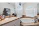 Bright bathroom featuring soaking tub, double sinks, and white cabinets at 7046 Frascati Loop, Wesley Chapel, FL 33544