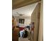 A bedroom with a ceiling fan and an AC unit in the window and view from the doorway at 714 Gray S St, Gulfport, FL 33707