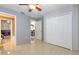 Empty bedroom with neutral flooring, a closet, and views of the en-suite bathroom at 7254 Parkersburg Dr, Wesley Chapel, FL 33545