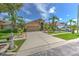 Beautiful home with a large driveway, well-maintained lawn, and mature landscaping at 7254 Parkersburg Dr, Wesley Chapel, FL 33545