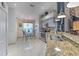Charming eat-in kitchen with a view to the living room offers a cozy and functional space at 7254 Parkersburg Dr, Wesley Chapel, FL 33545
