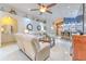 Comfortable living space with neutral tones, open layout, and stylish furnishings at 7254 Parkersburg Dr, Wesley Chapel, FL 33545