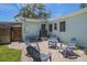 Inviting brick patio with comfortable outdoor seating, ideal for relaxation at 745 Bruce Ave, Clearwater Beach, FL 33767