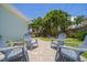 Charming backyard with seating offers peaceful outdoor space at 745 Bruce Ave, Clearwater Beach, FL 33767