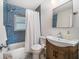 Updated bathroom featuring subway tile in shower and modern vanity at 745 Bruce Ave, Clearwater Beach, FL 33767