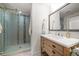 Bathroom with a decorative shower and a rustic wood vanity at 745 Bruce Ave, Clearwater Beach, FL 33767