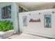 Charming beach access point with seahorse decor and 'Beach' sign, adding coastal charm at 745 Bruce Ave, Clearwater Beach, FL 33767