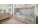 Cozy bedroom featuring bunk beds and a relaxing living space at 745 Bruce Ave, Clearwater Beach, FL 33767