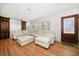 Spacious living room with hardwood floors and abundant natural light at 745 Bruce Ave, Clearwater Beach, FL 33767