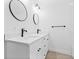 Modern bathroom featuring double sinks, quartz countertop and hexagon tile flooring at 7617 Alvina St, Tampa, FL 33625