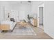 Cozy living room with neutral decor, stylish rug, and ample natural light at 7617 Alvina St, Tampa, FL 33625