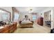 Cozy bedroom featuring neutral décor, dresser and vanity, perfect for relaxing at 7710 Jackson Springs Rd, Tampa, FL 33615