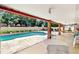 Relaxing outdoor area with a spacious patio and inviting swimming pool at 7710 Jackson Springs Rd, Tampa, FL 33615