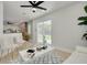 Bright living room with open layout, view to back yard, and stylish decorative accents at 7815 Shadow Run Dr, Largo, FL 33773