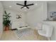 Inviting living room with stylish decor, light wood floors, and comfortable seating at 7815 Shadow Run Dr, Largo, FL 33773