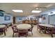 A community bar with seating and tables for relaxation and socialization at 10033 64Th N Ave # 4, St Petersburg, FL 33708