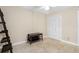 A neutral-toned bedroom with travertine tile flooring, large closet, and a ceiling fan at 10033 64Th N Ave # 4, St Petersburg, FL 33708