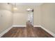 The dining room features modern wood flooring and a stylish light fixture at 10033 64Th N Ave # 4, St Petersburg, FL 33708