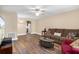 Open concept living space with hardwood flooring, and modern furnishings at 10033 64Th N Ave # 4, St Petersburg, FL 33708
