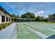 Shuffleboard courts with a covered area for players and clear blue skies overhead at 10033 64Th N Ave # 4, St Petersburg, FL 33708