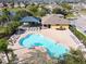 Community pool with lounge chairs and shaded picnic area at 1012 Seminole Sky Dr, Ruskin, FL 33570