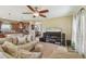 Comfortable living room with an open view to the kitchen and dining area, perfect for entertaining at 1012 Seminole Sky Dr, Ruskin, FL 33570