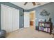 This office has blue walls, a ceiling fan, a closet, and an adjacent room at 1012 Seminole Sky Dr, Ruskin, FL 33570