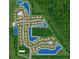 Aerial view of the community with ponds, green spaces, and neatly arranged homes at 10824 Quickwater Ct, Riverview, FL 33569