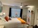 Bedroom with ensuite bathroom and ceiling fan at 10824 Quickwater Ct, Riverview, FL 33569
