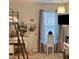 Bedroom features a loft bed with a study nook and silver curtains at 10824 Quickwater Ct, Riverview, FL 33569