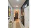 Inviting entryway featuring tiled floors and a chalkboard accent wall at 10824 Quickwater Ct, Riverview, FL 33569