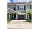 Charming townhome with a one-car garage and well-maintained landscaping at 10824 Quickwater Ct, Riverview, FL 33569