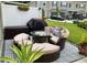 Outdoor patio area featuring a fire pit and a cushioned outdoor furniture set at 10824 Quickwater Ct, Riverview, FL 33569
