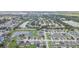 Panoramic aerial view of a residential community featuring verdant landscaping and tranquil lakes and ponds at 11913 Butler Woods Cir, Riverview, FL 33579