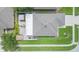 Aerial shot of a single-Gathering home with a large brick patio in a well-maintained neighborhood at 11913 Butler Woods Cir, Riverview, FL 33579