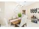 Formal dining room features a wood table, upholstered chairs, and stylish decor at 11913 Butler Woods Cir, Riverview, FL 33579