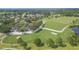 Picturesque aerial view of a golf course with lush green fairways and manicured landscaping at 11913 Butler Woods Cir, Riverview, FL 33579