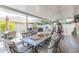 Relaxing outdoor patio with comfortable seating, and access to the barbecue area at 11913 Butler Woods Cir, Riverview, FL 33579