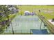 Multi-sport court featuring basketball and tennis, designed for active community engagement at 11913 Butler Woods Cir, Riverview, FL 33579