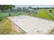 Aerial view of sand volleyball court with basketball court and other amenities at 11913 Butler Woods Cir, Riverview, FL 33579